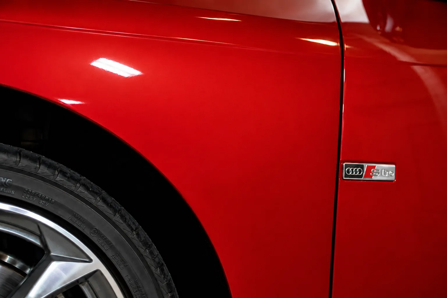 After: deep scratch removed from a red Audi fender in Albany NY — Capital Region